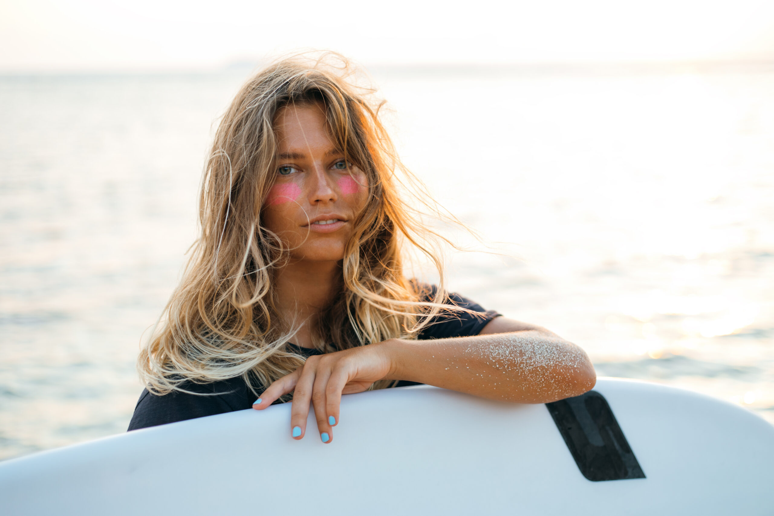 GIRL WITH SURF BOARD
